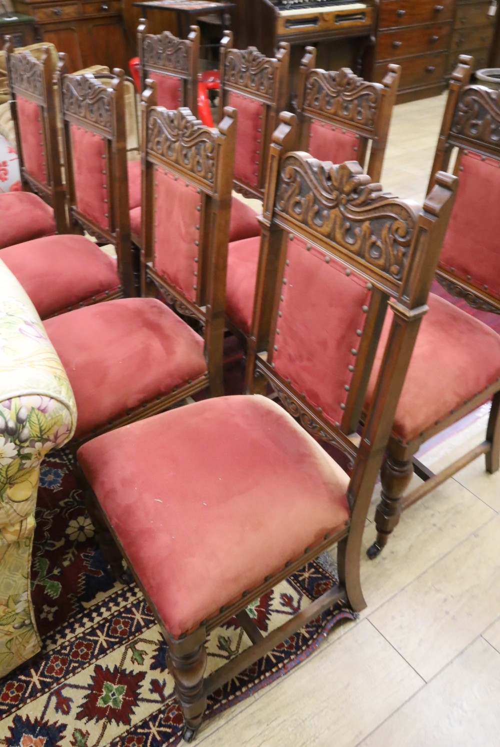 A set of eight Edwardian walnut dining chairs